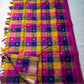 Navaranga Kattam — Multi-Color Paalum pazhamum checks  Kanchipuram Pure Silk

Rani-magenta contrast border & rich zari pallū 

Gold coin & peacock buttas over jewel-tone squares

Handloom Kanchipuram • Matching magenta blouse with borders