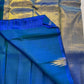 Neelam ettukol 
Pure Kanchipuram Silk Saree – Deep Ocean Blue with Silver Zari Ikat Motifs
Rich 8 Kol Weave for Heavier, Denser & Lustrous Drape
Silver Tissue Pallu with Intricate Brocade Weaving
Includes Matching Blue Blouse Piece with Zari Border