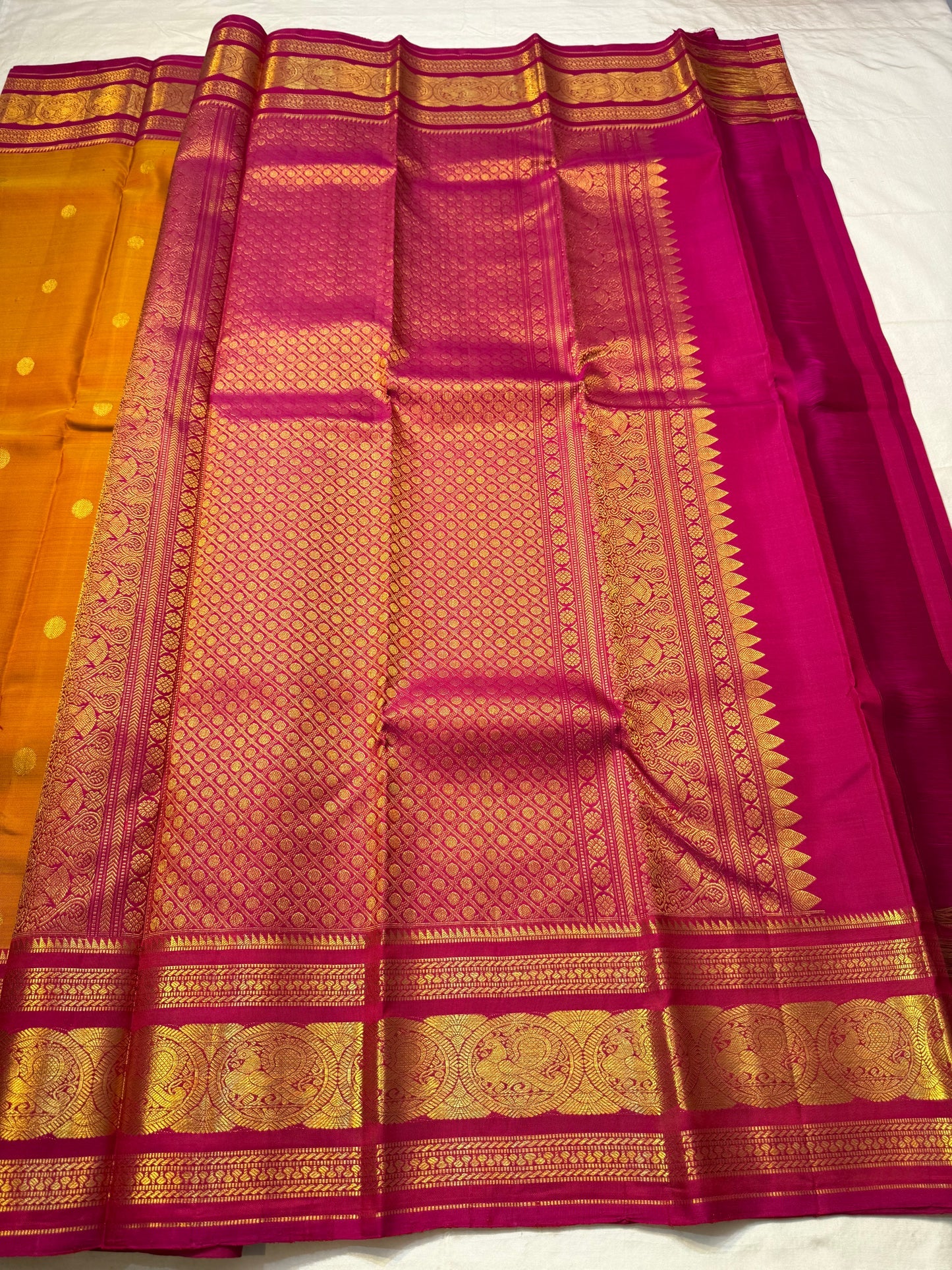 Rust Orange Pink Radiance — Pure Silk Kanchipuram
Earthy rust-orange body with gold coin buttas & rani pink korvai border in grand zari medallions
Silk Mark Certified • Free USA Shipping • Ships in Two Weeks ✅