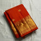 Maya
Vibrant Orange Kanchipuram Silk Saree with Lustrous Gold Coin Buttas
Handwoven Traditional Rudhraksham Seer and Intricate Arai Maadam Zari Border
Richly Crafted Pallu Featuring Elegant Gold Zari Panels for a Regal Finish