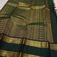 Riya – Orange Silk Saree with Dark Green Zari Border
Radiating warmth and festive charm, Riya  glows in a rich ombré of orange and vermilion, adorned with dainty gold butta motifs that shimmer gently with movement.