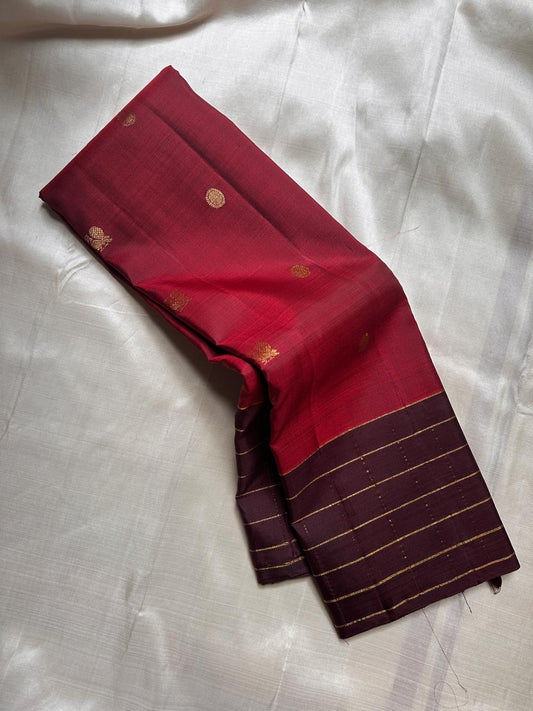 Poornima Kalyani
Kungumam Red & Cocoa Kanchipuram Silk Saree
Zari Buttas · Grid Borders · Silk Mark Certified