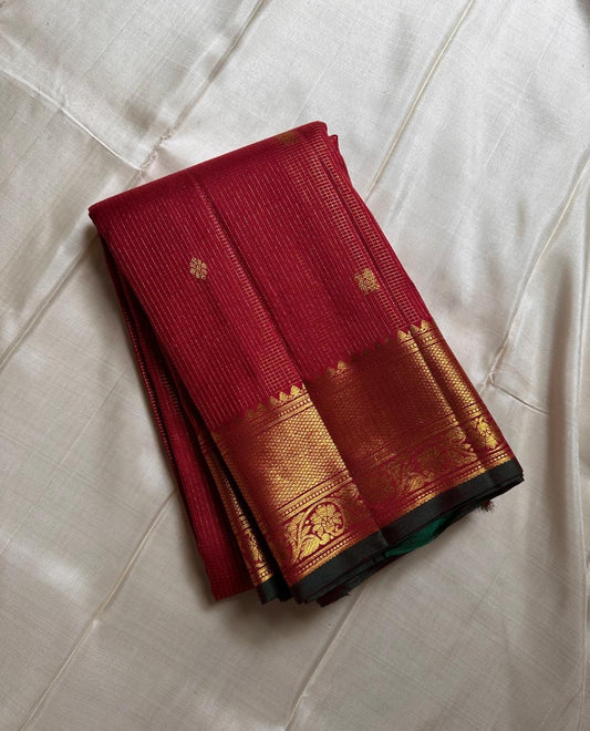 Mihira – Kalyana Arraku Kanchipuram Pure Silk Saree with Zari Kattam, Mayil & Kamalam Buttas, Floral Arai Madam Border, and Adai-Woven Parrot Pallu