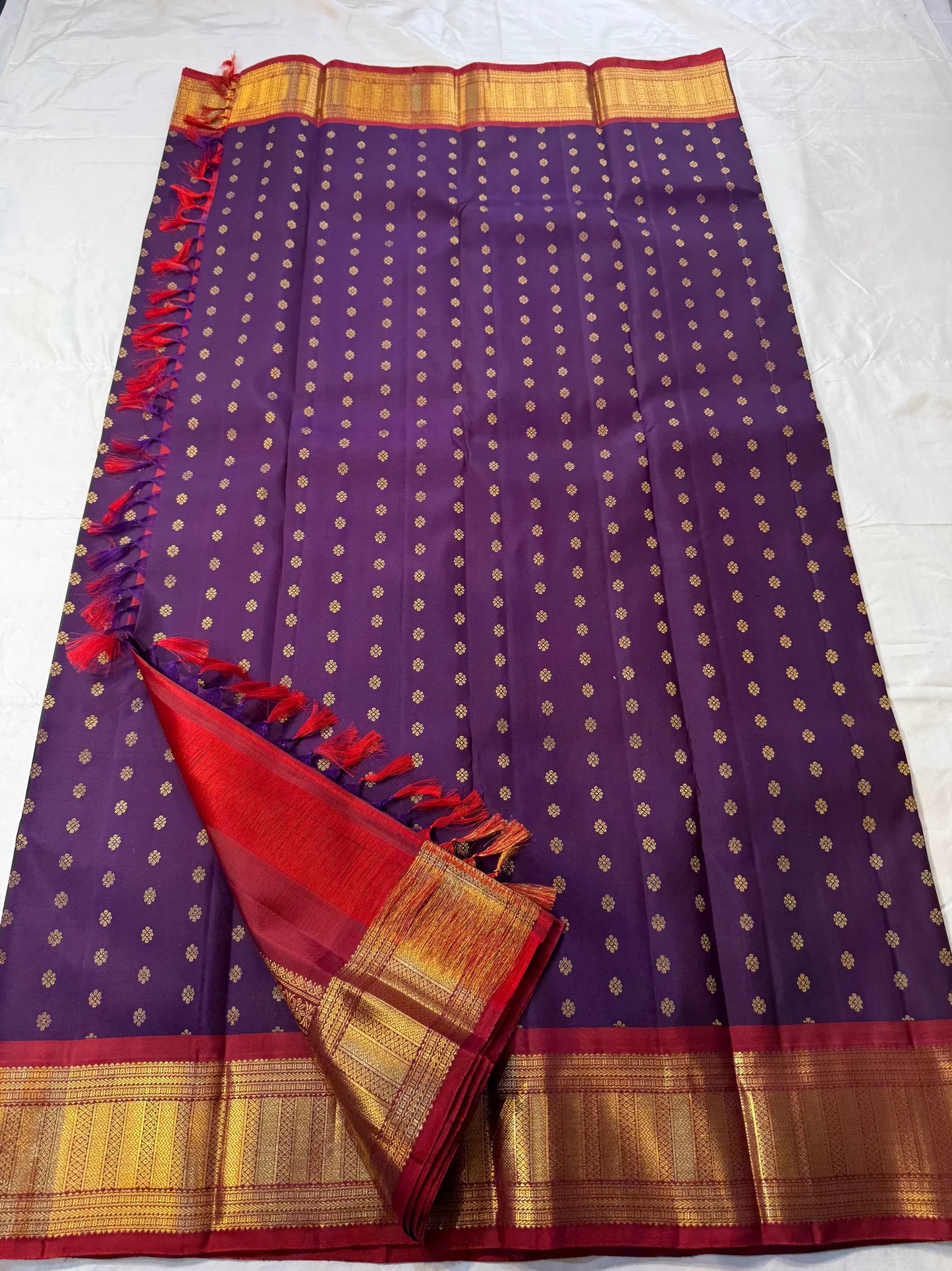 Sindhu – Royal Purple Kanchipuram Pure Silk Saree with Gold Zari Floral Buttas, Crimson Rettapet Border & Ornate Pallu