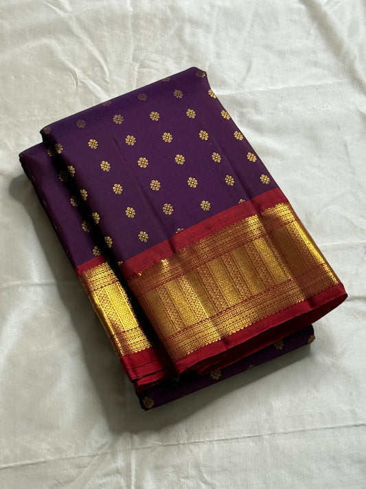Sindhu – Royal Purple Kanchipuram Pure Silk Saree with Gold Zari Floral Buttas, Crimson Rettapet Border & Ornate Pallu