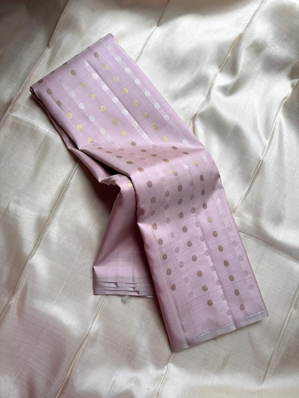 The daintiest blush pink with zari coin buttas in gold and silver pure silk Kanchipuram saree
