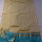 Body: pastel lemon-cream with tiny gold zari buttas

Borders/Pallu: sea-foam aqua with temple (reku) peaks & paisley vine zari

Silk Mark Certified • Free USA Shipping • Ships in Two Weeks