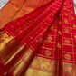 Srija – Red-Orange zari kattam  Kanchipuram Pure Silk Saree with Zari Checks, Kamalam Buttas & Vanasringaram Border