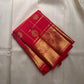 Srija – Red-Orange zari kattam  Kanchipuram Pure Silk Saree with Zari Checks, Kamalam Buttas & Vanasringaram Border