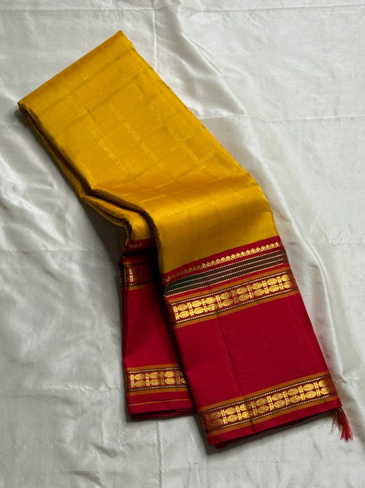 Vasantha Malli ✨
Pure Kanchipuram Silk Saree in Marigold & Kumkum Red
Marigold body with delicate woven checks
Kumkum-red border highlighted with Manthulir Green

Silk Mark Certified, delivery in 2 weeks