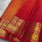 Fiery orange red shot double  color small flower motif with vanasringaram and Rudhraksham border pure silk mark certified Kanchipuram saree