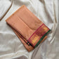 Pure silk kanchipuram Biscuit beige  color body with zari buttas , magenta mayil border with green selvedge