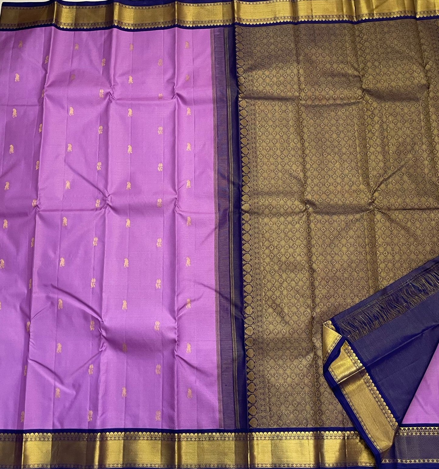 Pure Kanchipuram silk saree in lavender with deep blue border and gold zari