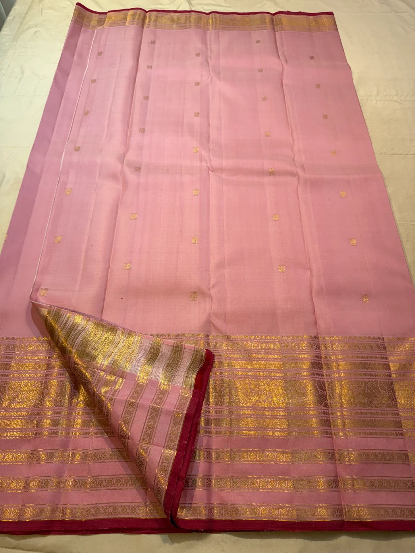 Close view of the Varisaipet gold zari border with elephant motifs