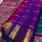 Peacock Blue pure silk Kanchipuram saree, Zari Kattam weave with Purple border — pallu detail