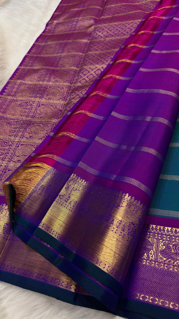 Peacock Blue pure silk Kanchipuram saree, Zari Kattam weave with Purple border — pallu detail