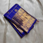 Kalyana Neelam Kattam — Kanchipuram Pure Silk

Deep royal neelam blue body with kattam (grid) checks & mayil buttas

Grand gold kaddi border with ornate paisley vines; rich zari pallu

Silk Mark Certified | Free Shipping within USA

Dispatch in 1 Week