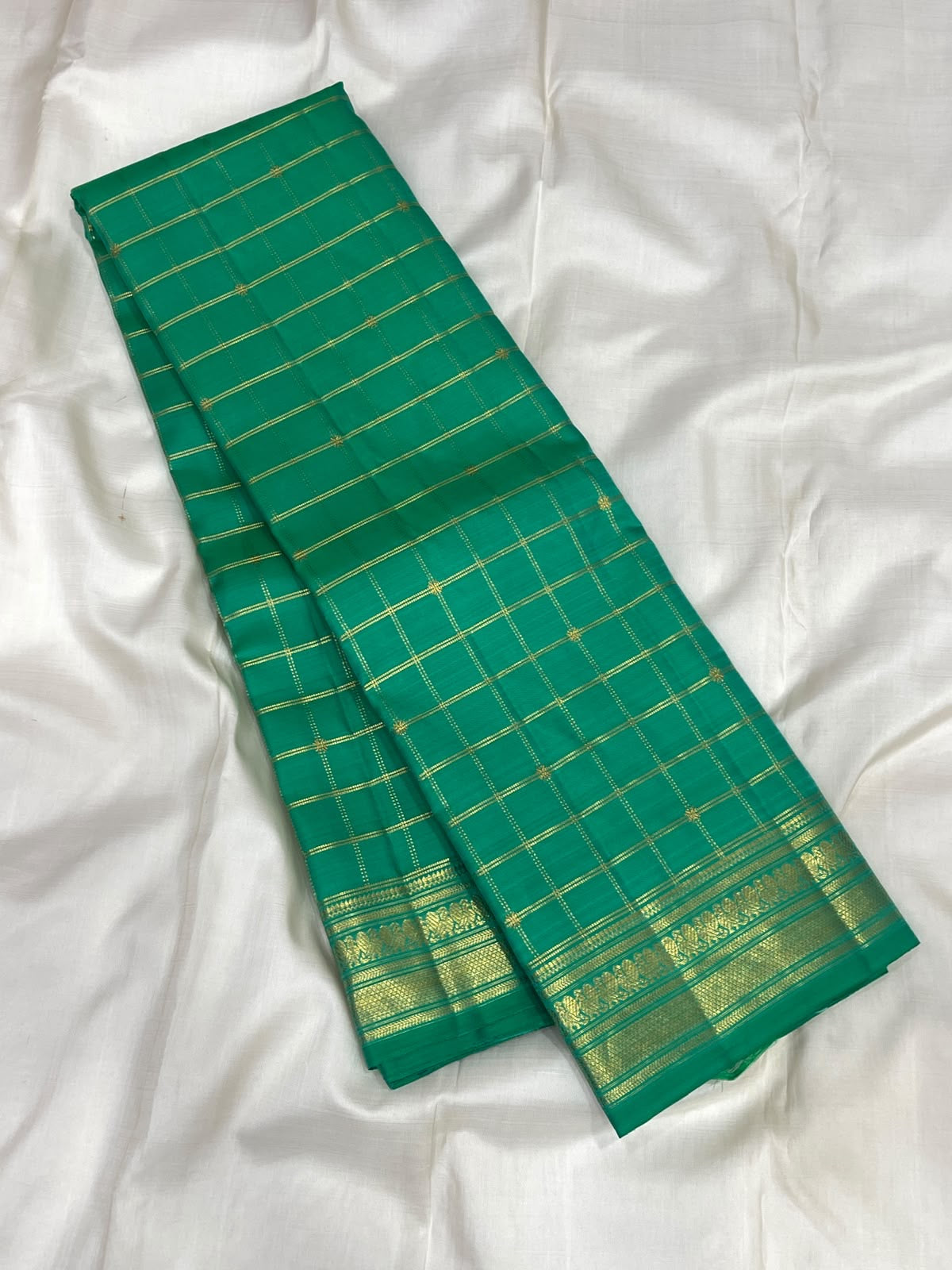 Handwoven jade green pure silk Kanchipuram saree with Vankipet border