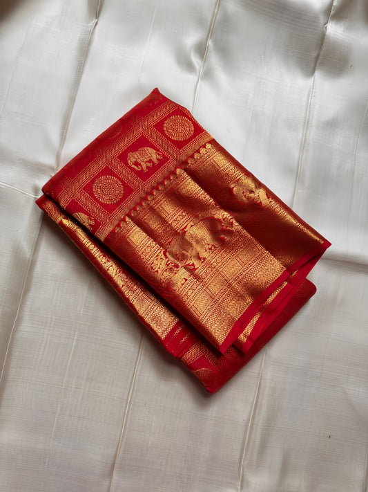 Opulent red Zari kattam with elephant and kamalam motifs spread all over pure silk Kanchipuram saree