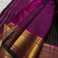 Charcoal Zari Kattam – Pure Kanchipuram Silk Saree
Rich Charcoal Black Body with Gold Zari Checks
Broad Golden Border with Magenta Highlights & Green Selvedge
Royal Magenta Pallu with Lustrous Zari Stripes

Silk Mark Certified, delivery in 2 weeks