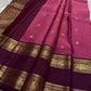 Saanvi – Lotus Pink & Magenta Shot Kanchipuram Silk Saree
Saanvi features zari buttas of mayils and chakrams across the body. A deep wine rettapettu border showcases twin peacocks in a temple arch. The pallu mirrors this grandeur with sorgavasal motifs !