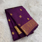 Authentic Kancheepuram silk saree featuring jamun-toned purple silk and intricate gold zari craftsmanship