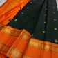 Nirupama ✨ – Bottle-Green Kanchipuram Pure Silk Saree
With Striking Saffron-Orange Korvai Contrast Border rettapet 
Adorned with Gold Rosette Buttas & Medallion Bands
Grand Zari Brocade Pallu in Cascading Motifs