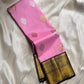 Roja Sonaroopa – Pure Kanchipuram Silk Saree
Blush Pink Body with Gold & Silver Paisley Buttas
Ebony Korvai Border with Temple Pillar Zari Design
Antique Gold Brocade Pallu with Grand Detailing

Silk Mark Certified, delivery in 2 weeks