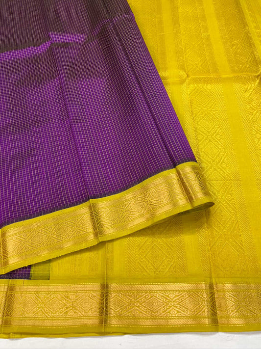 ✨ Silk Cotton Saree – Purple Kattam with Yellow Zari Pallu ✨
A vibrant fusion of elegance and tradition. The purple body is woven in fine kattam checks, paired with a radiant yellow border and grand zari pallu. Lightweight, lustrous