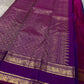 Purple Allure – Pure Kanchipuram Silk Saree
Peacock-blue body adorned with petite zari floral buttas 🌸
Contrast royal-purple border with grand elephant procession 🐘
Rich zari brocade pallu in floral motifs ✨

Silk Mark Certified, delivery in 2 weeks