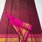 Arakku Kattam Mayura Chakram – Pure Silk Kanchipuram Saree (Maroon & Rani Pink)

Micro-check body with tiny gold buttas; vibrant rani contrast

Antique-gold peacock chakram border & grand woven zari pallu

Silk Mark Certified | Blouse Piece Included |