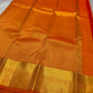 Agnika – orange Kanchipuram Silk Saree with Mayil Chakram Butta & Orange Border Fiery and regal, Agnika is a pure Kanchipuram silk saree featuring a rich red body adorned with intricate Mayil Chakram buttas.