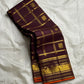 Then Thuli — Pure Silk Kanchipuram Saree
Coffee plum with gold kattam checks & mango buttas
Antique-gold peacock borders, brocade pallu, tasselled finish
Silk Mark Certified ✅ • Ships in Two Weeks ✅ • Free USA Shipping ✅