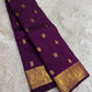 Handwoven Kanjeevaram silk saree featuring deep amethyst purple body and traditional gold zari buttas