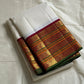 Shveta Chakram — Ivory Kanchipuram Pure Silk 🤍

Contrast maroon brocade pallu & temple border ✨

Chakra medallions, floral vines + green selvedge 🌿

Orange pin-stripes on the border; tasselled finish 🪔

Silk Mark Certified • free shipping with Usa with