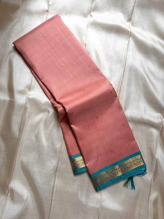 Calmest peach with small sari woven buttas with blue petite border Rudhraksham motif border