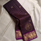 Sorgavaasal Kili , stunning motif in dark brown and purple zari kattam zari woven yazhi buttas in pure silk kanchipuram