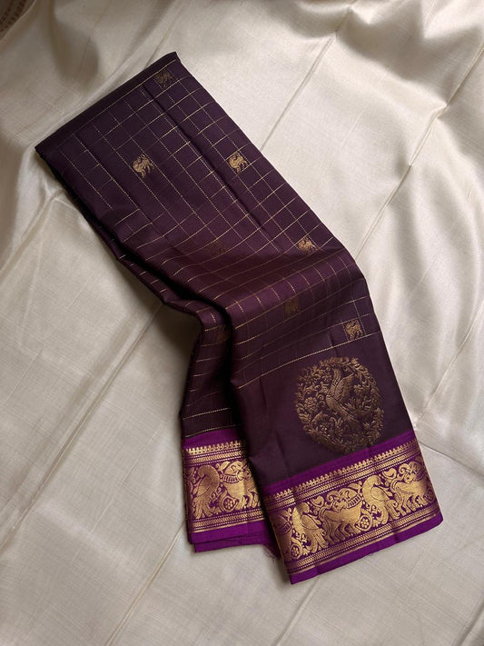 Sorgavaasal Kili , stunning motif in dark brown and purple zari kattam zari woven yazhi buttas in pure silk kanchipuram