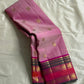 Pink Ombre Kanchipuram Pure Silk

Fuchsia Korvai Border • Charcoal stripes

Gold Zari Buttas (chakram & mango)

Rich zAri Pallu • Blouse included

Silk Mark Certified • Free USA Shipping • Ships in Two Weeks

— Pink Ombre Butta Korvai
