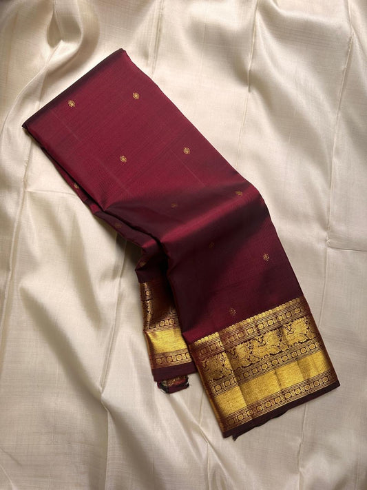Deep brown small flower motif with vanasringaram and Rudhraksham border pure silk mark certified Kanchipuram saree