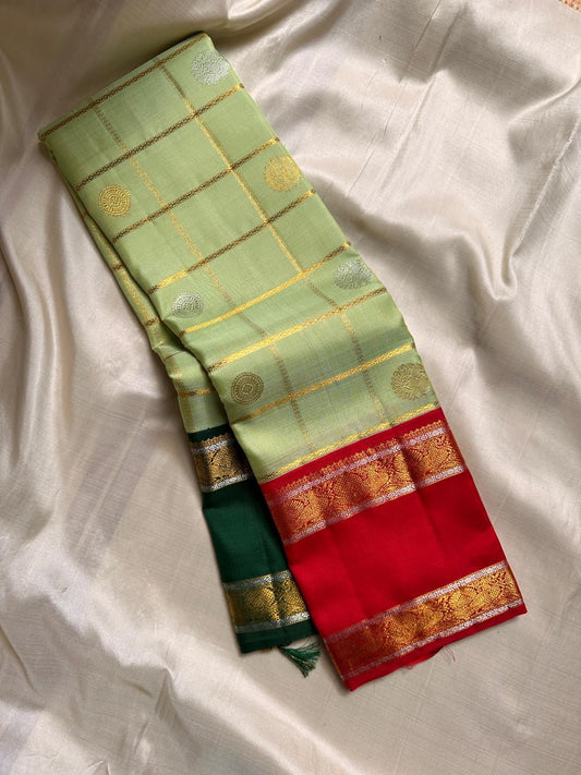 Pistachio Ganga Jamuna – Pure Kanchipuram Silk Saree
pistachio green body with zari kattam & floral buttas ✨
Ganga Jamuna borders in emerald green & vermilion red 🌿🔥
vermilion red pallu richly woven with zari, Silk Mark Certified, delivery in 2 weeks