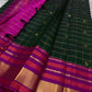 Emerald Blossom ✨ – Pure Kanchipuram Silk Saree
Bottle-Emerald Green Body with Zari Checks & Buttas
Korvai Rani-Pink & Purple Contrast Border with Rich Zari
Grand Rani-Pink Brocade Pallu with Temple motifs , Silk Mark Certified, delivery in 2 weeks