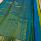 Citrus and Teal – Pure Kanchipuram Silk Saree
Dual-tone body in parrot green and turmeric.
Elegant gold leaf buttas across the drape.
Teal korvai border
Rich teal pallu with diamond jaal and temple motifs.

Silk Mark Certified, delivery in 2 weeks