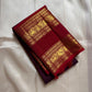 Purnima ✨ – Kumkum-Red & Aubergine Kanchipuram Pure Silk Saree
With Zari Winged Horse Buttas on the Aubergine Body
Grand Gold Annam & Floral Korvai Border with Temple Rekku
Varisaipettu Striped Gold Brocade Pallu with Hand-Knotted Tassels
Silk Mark