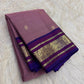 Dusty Mauve Handwoven Pure Silk Kanchipuram Butta Saree with Royal Blue Border photographed folded to show the body colour, motifs, and border details.