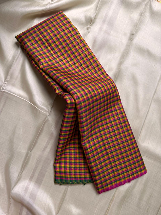 Mutyam – Handwoven Borderless Kanchipuram Pure Silk Saree with Traditional Paalum Pazhamum Baby Checks or kasa kasa kattamDual Contrast Green & Pink Selvedges, and a Subtle Zari Woven Pallu