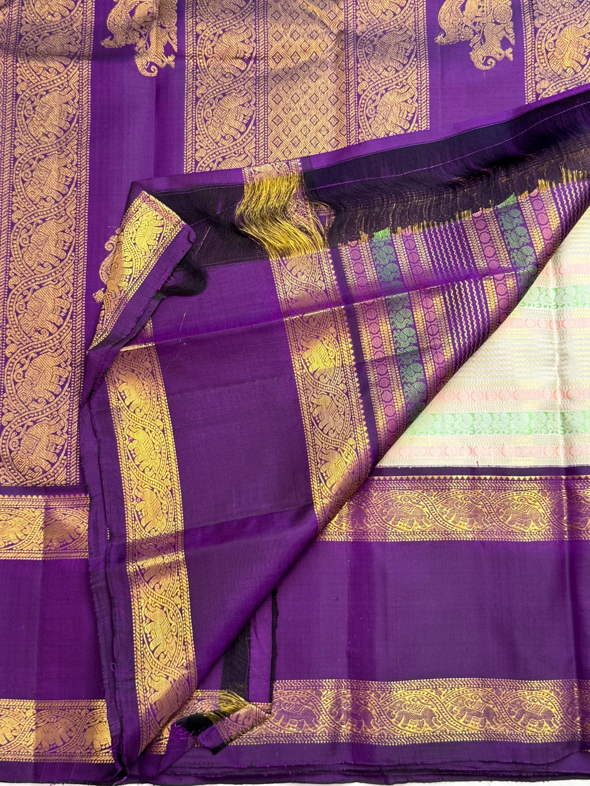Ivory pastel handwoven Kanchipuram pure silk saree woven over 39 days on the loom