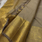 Chiku Orchard – Pure Kanchipuram Silk Saree
Elegant Chiku (Taupe) Body with Gold Paisley Buttas
Rich Antique Gold Zari Borders with Floral Motifs
Grand Gold Zari Pallu with Traditional Kattam Design
Silk Mark Certified | Ready to Ship | ships in two weeks