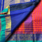 Chemman Maragatha Kattam
Pure Kanchipuram Silk Saree – Reddish-Orange & Maragatha Green Micro Checks
Deep violet korvai borders with gold zari floral motifs
Grand zari pallu with classic brocade detailing
Silk mark certified, ships in 2 weeks