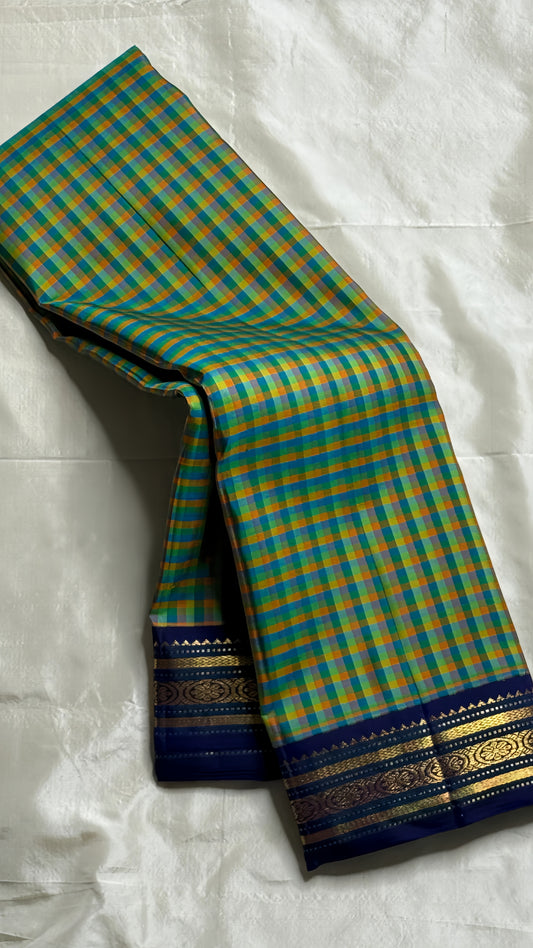 Charcoal Ash Blush Kattam
Pure Kanchipuram Silk Saree – Charcoal Grey, Black & Blush Pink Checks
Contrast deep red korvai borders with intricate gold zari temple motifs
Grand zari pallu, silk mark certified.ships in 2 weeks